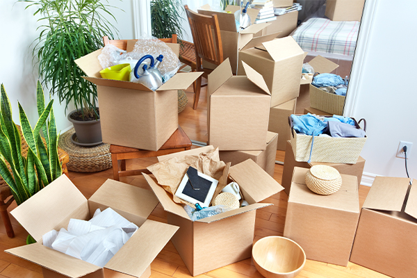 Moving boxes scattered in home