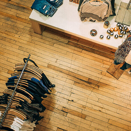 Birdseye view of clothing store with hardwood floors