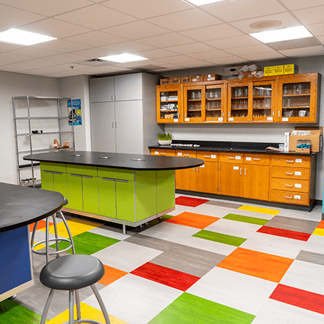 Colorful tile floor and cabinets in classroom